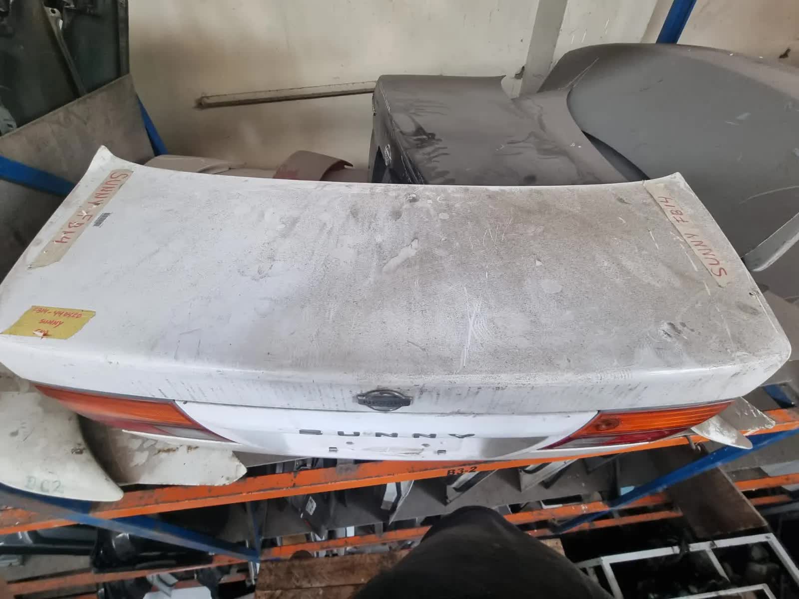 MALETERA NISSAN SUNNY 1994-1997 FB14 C/REFLECTIVO